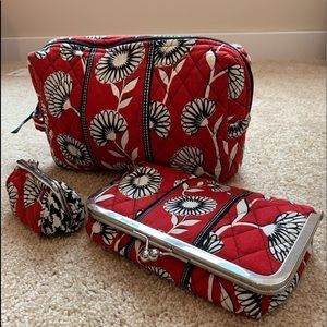Vera Bradley cosmetic cases and coin case.